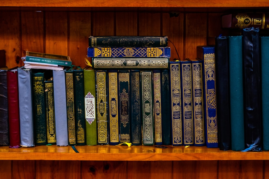 Islamic books on a shelf at the Heidelberg mosque.