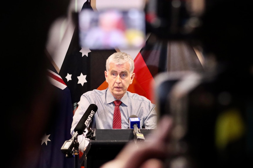 NT Acting Chief Health Officer Charles Pain speaking at a press conference at Parliament House.