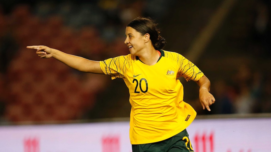 Matildas striker Sam Kerr points her finger after scoring a goal