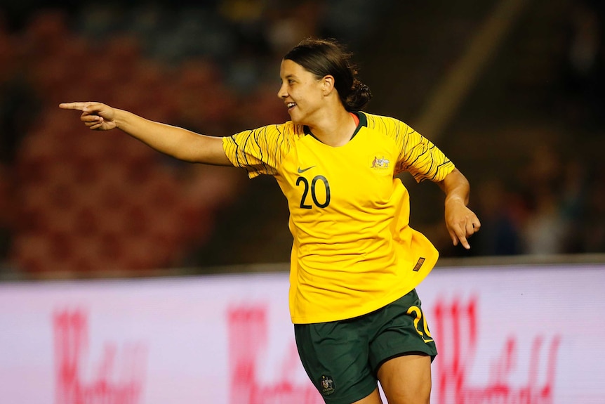 Matildas striker Sam Kerr points her finger after scoring a goal