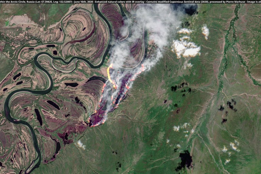 satellite photo showing green landscape with fires burning