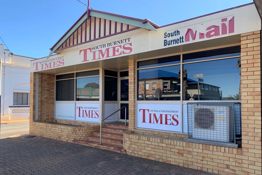 Photo of a building with a sign reading 'South Burnett Times'.