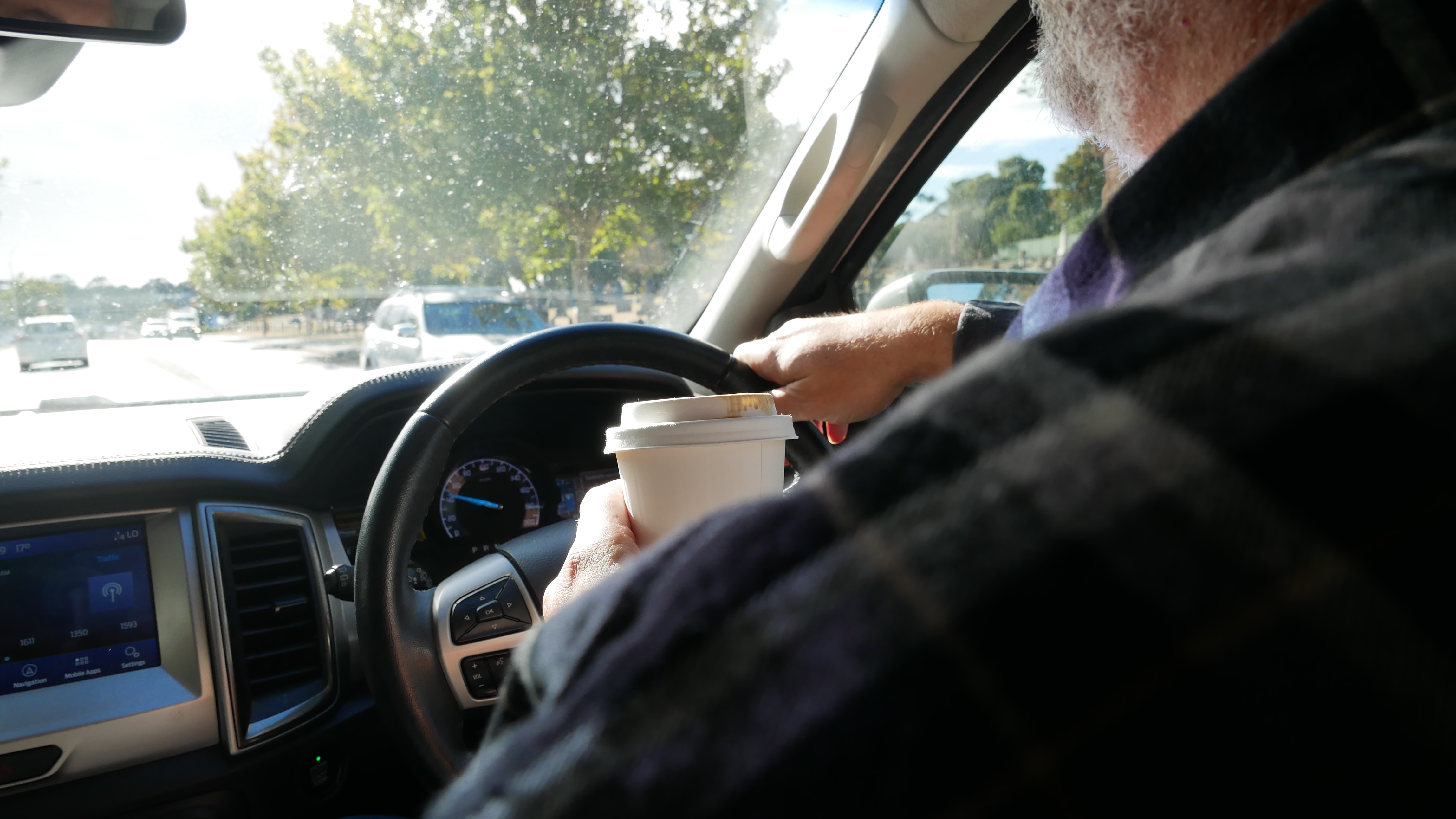 Eating and drinking among most dangerous driver distractions, study finds