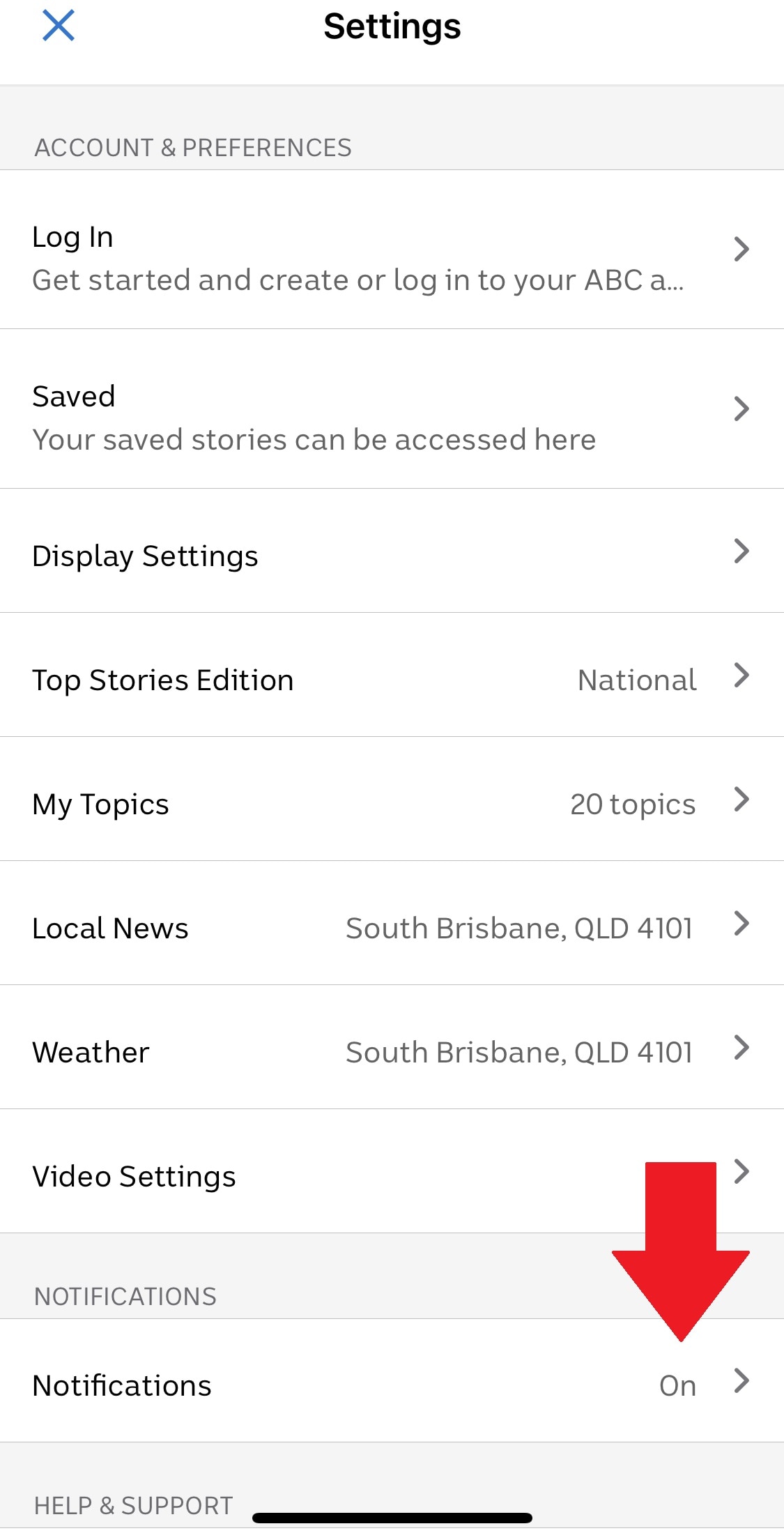 A screenshot of an arrow pointing to the Notifications screen on the ABC News App. 
