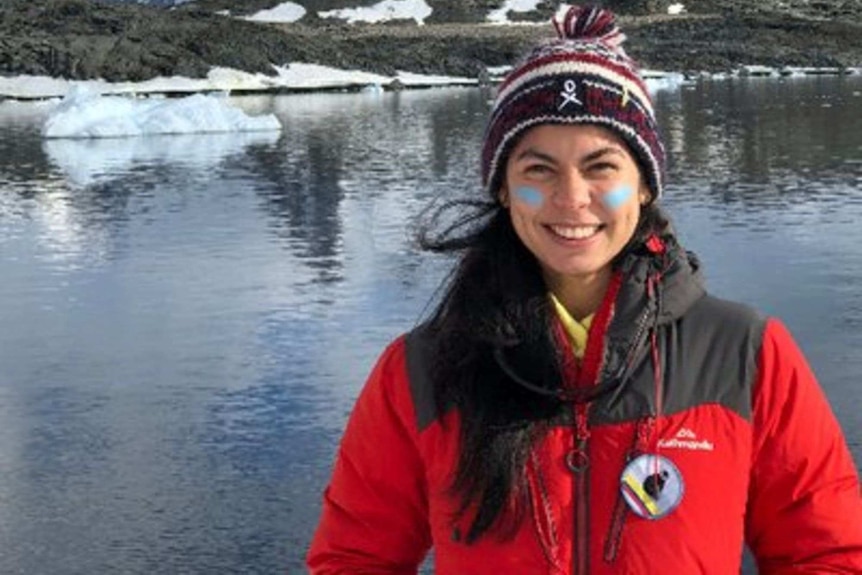 Paola stands on an ice sheet