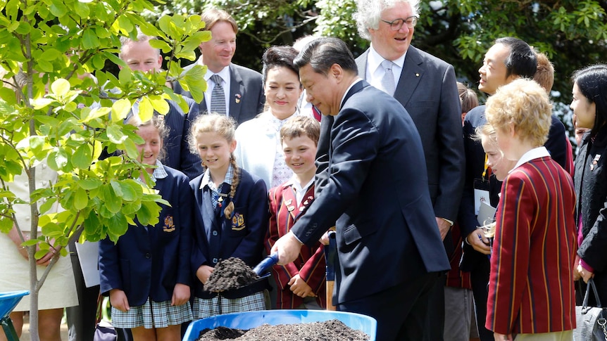 Chinese President Xi Jinping and Madame Peng plant a tree at  Government House Hobart