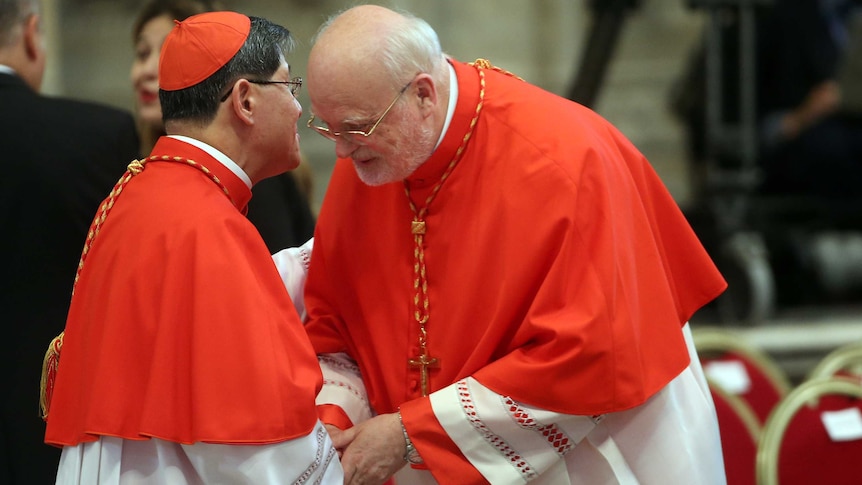 Cardinal Anders Arborelius being congratulated by the Archbishop of Manila cardinal Luis Antonio Tagle