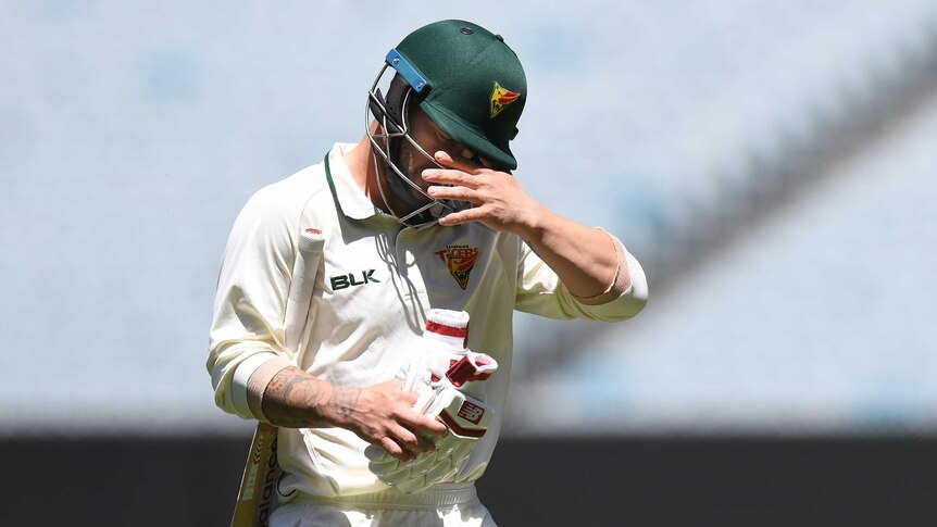 Matthew Wade of Tasmania reacts after being bowled against Victoria in the Sheffield Shield.