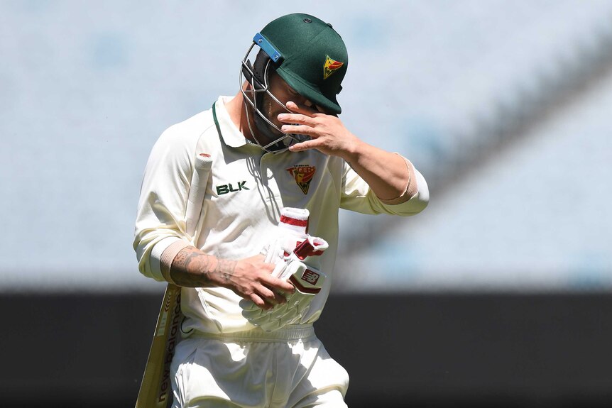 Matthew Wade of Tasmania reacts after being bowled against Victoria in the Sheffield Shield.