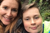 Selfie of Tracey Arnell and son Zachery on a walking track in the bush