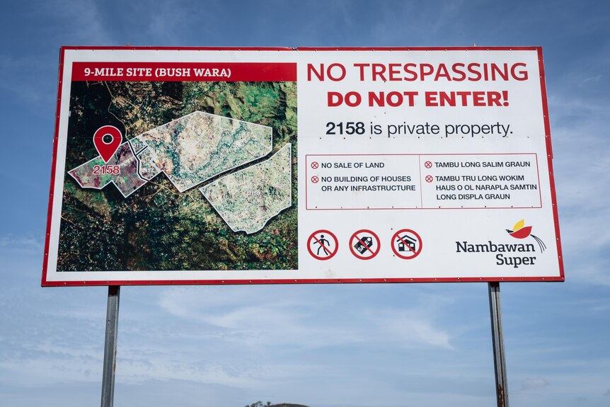 A sign on the land warns against private building