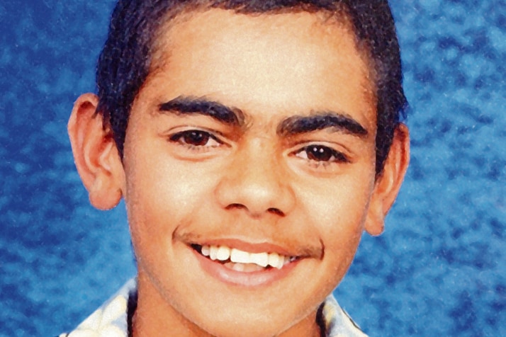 A school photo of a smiling Aboriginal student, TJ Hickey.