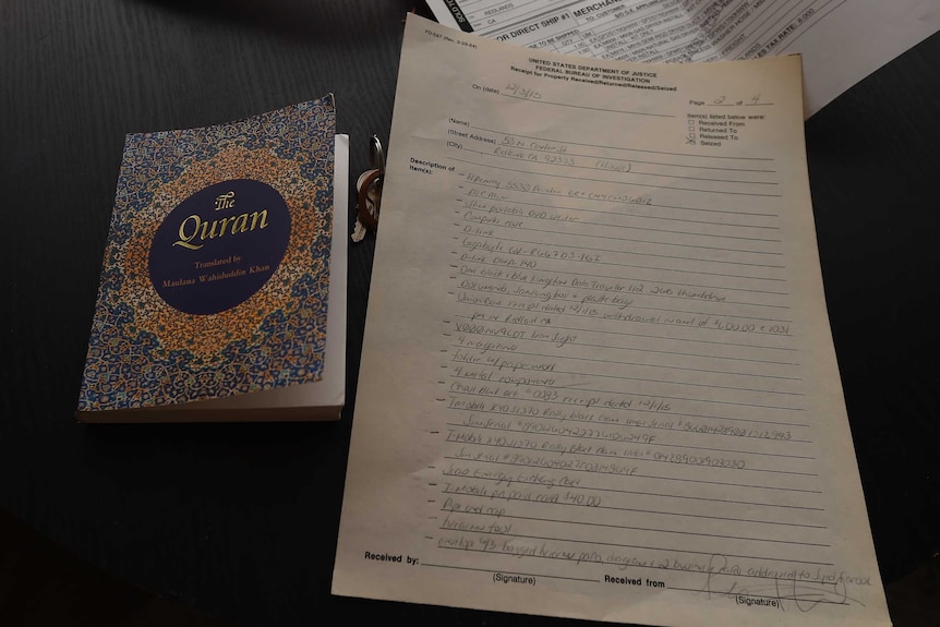 A copy of the Koran and a list of items seized by the FBI in Syed Farook's home