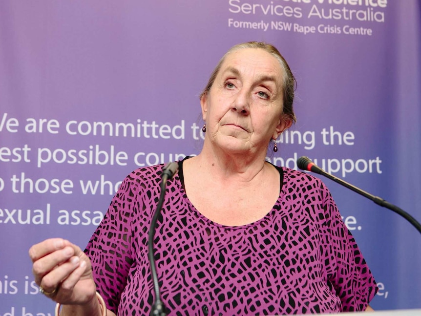 a profile photo of executive director of rape and domestic violence services australia karen willis with a serious expression