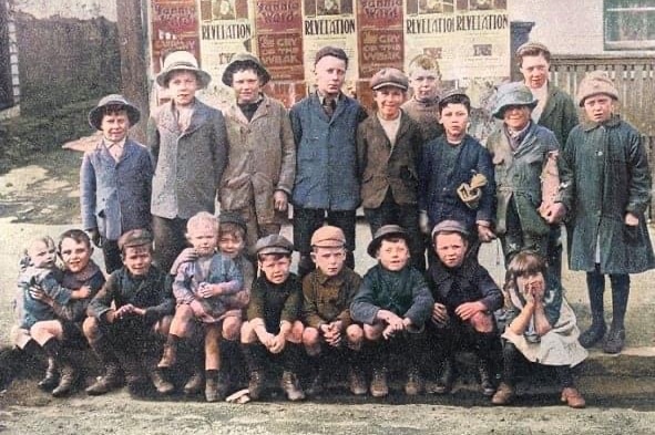 A group of early twentieth century children pose for a photograph