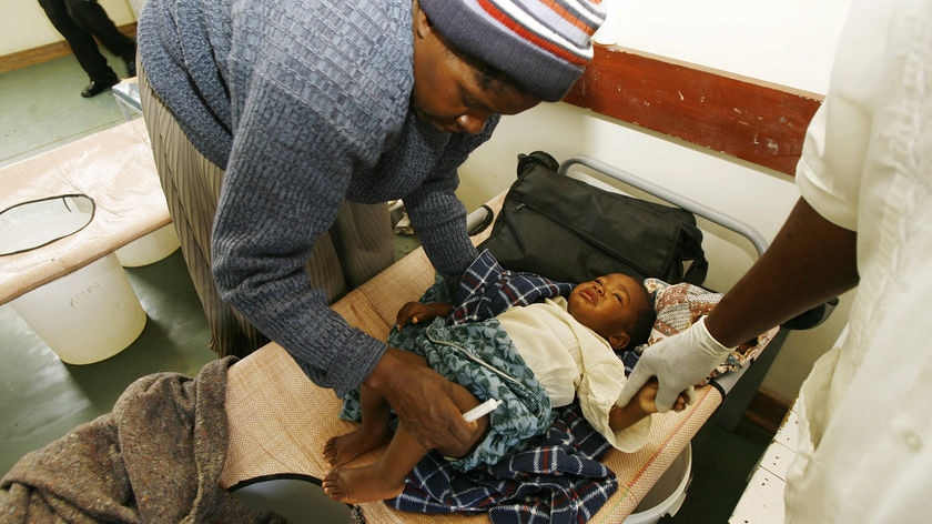 A Zimbabwean child is treated for cholera