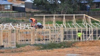 Workers on a construction site in the Adelaide Hills.