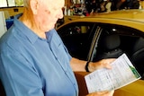 A car licence form is highlighted by pensioner Jim Waddell