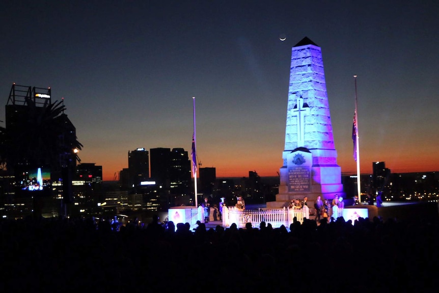 Dawn breaks at the Kings Park Anzac Day dawn service.