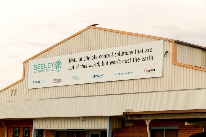 A sign advertises Seeley International