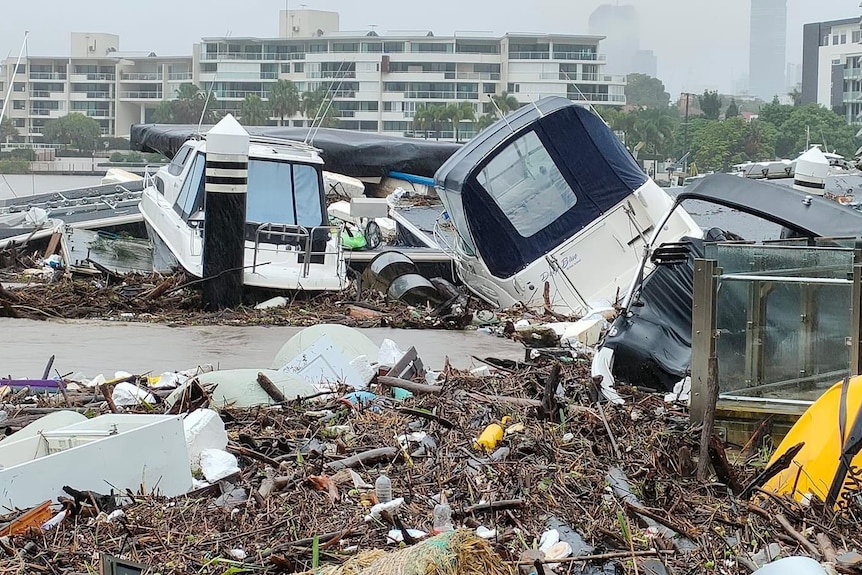 Severe damage to several boats and the ferry terminal at Hawthorne in Brisbane flood event