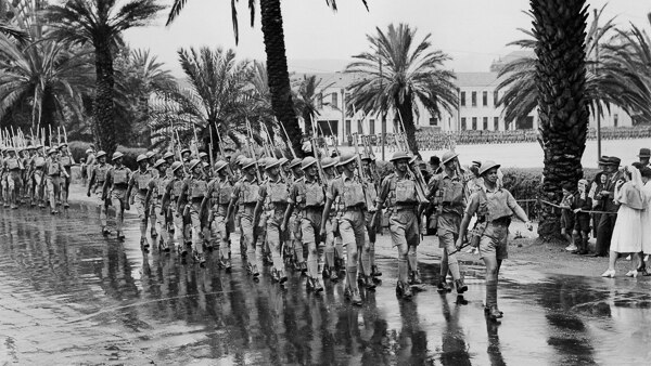 No 7 Platoon march past the Drill Hall in January 1945.