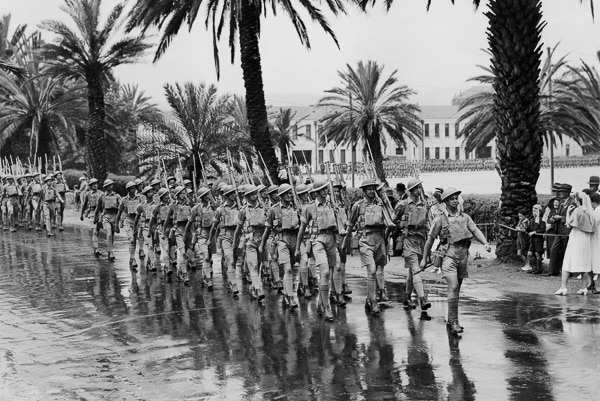 No 7 Platoon march past the Drill Hall in January 1945.