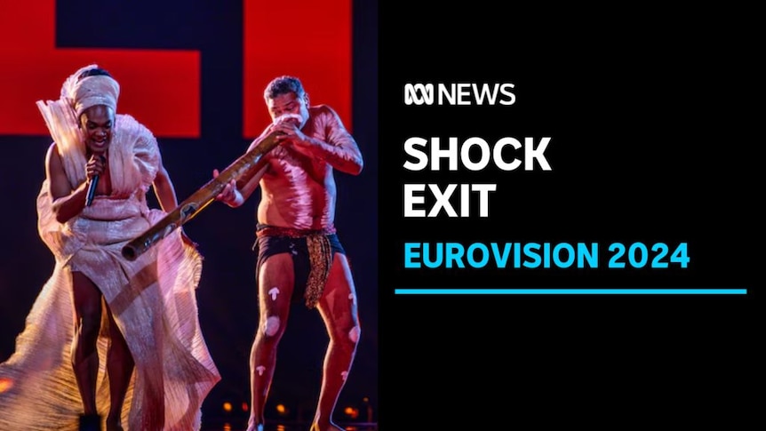 Shock Exit, Eurovision: A singer in an ornate gown sings into a microphone while a man plays a didgeridoo. 