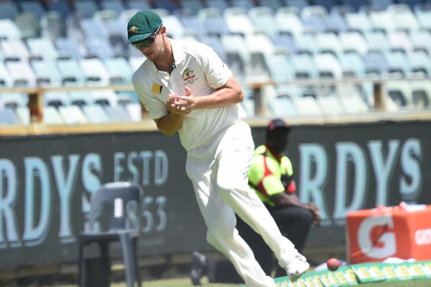 Josh Hazlewood makes a terrible attempt at a catch on day four at the WACA