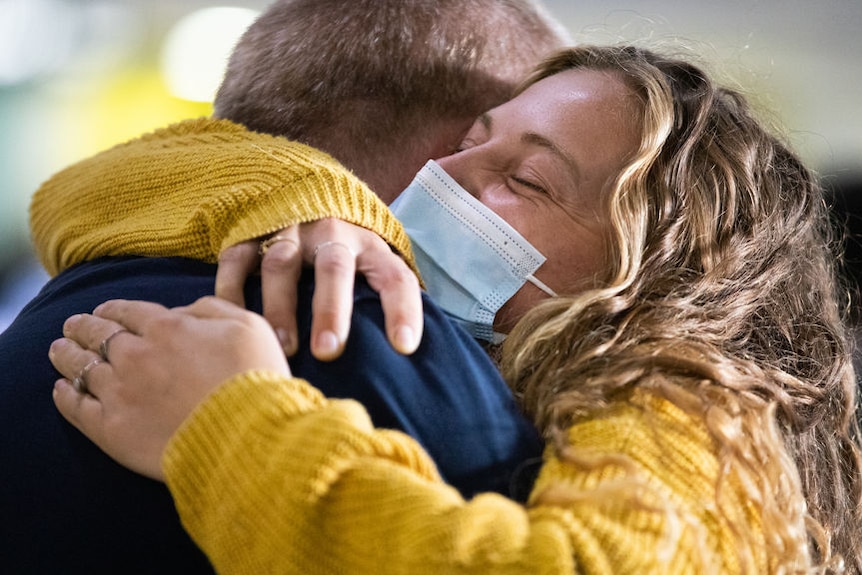 Tearful reunions at Perth Airport after WA border opens