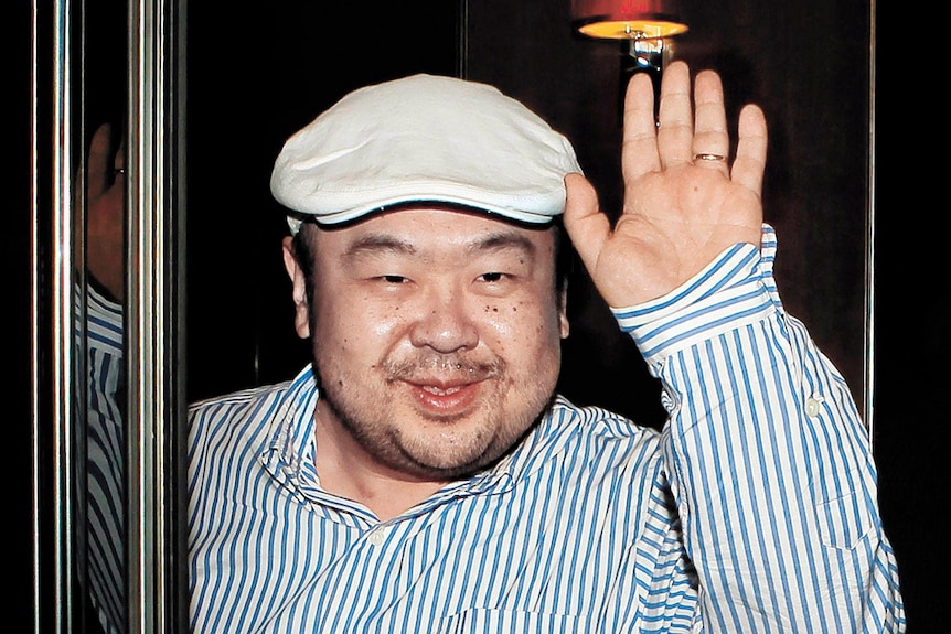 In this file photo, Kim Jong-nam waves after speaking to South Korean media.