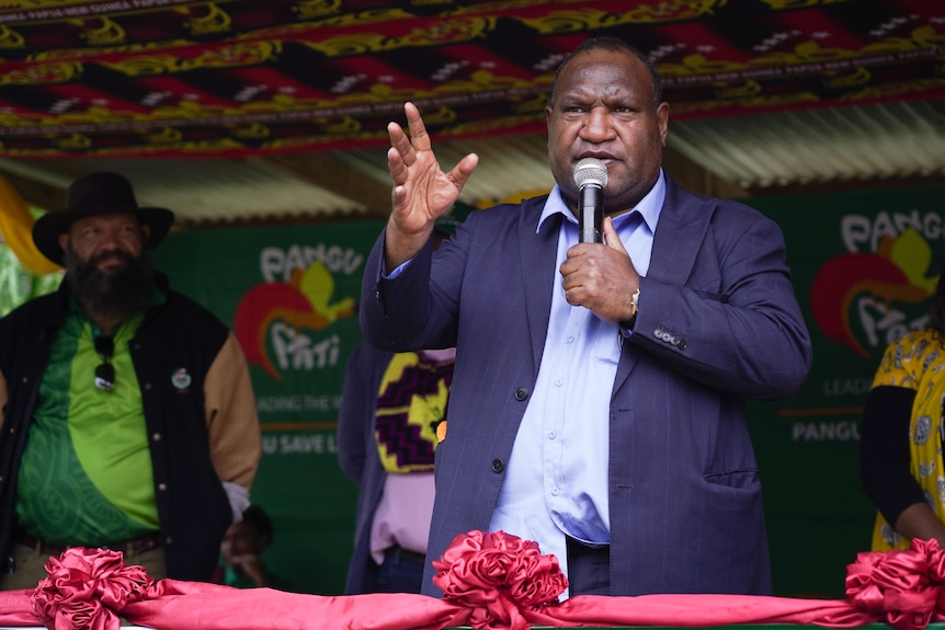 James Marape giving a speech to supporters.