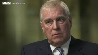 Prince Andrew looks away from the camera lens, with a BBC logo at the top of the image.