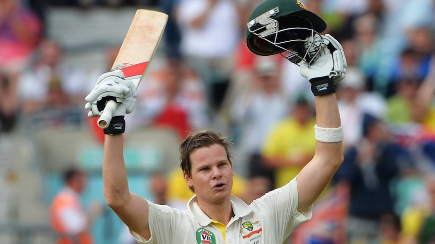 Steve Smith celebrates a century