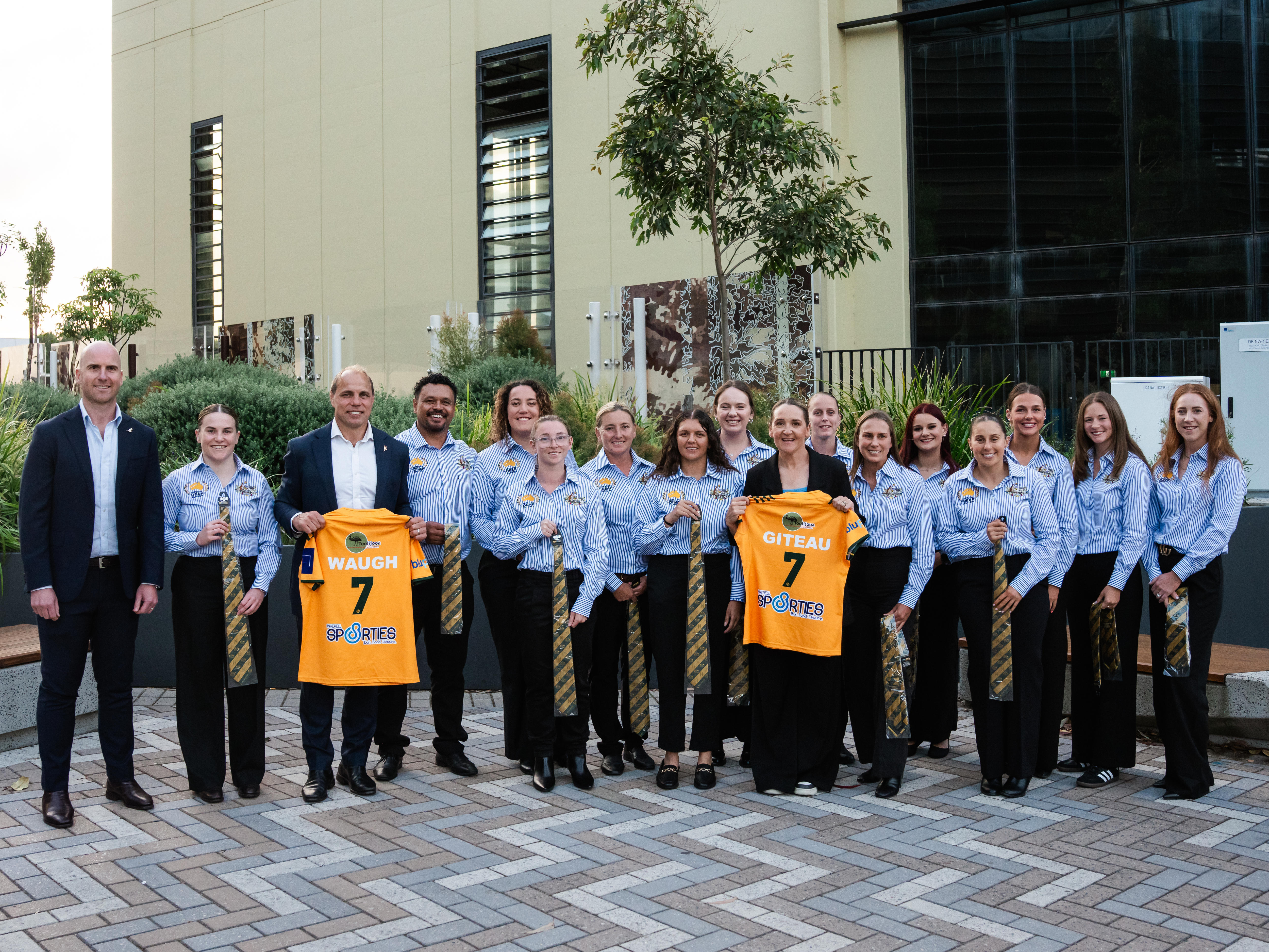 The Australian women's deaf rugby team presented with their ties in Sydney.
