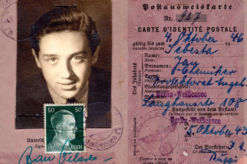 A German ID card from WWII with a photo of Hans, a stamp of Hitler. It bears the name Jan Sebesta and is dated 1943.