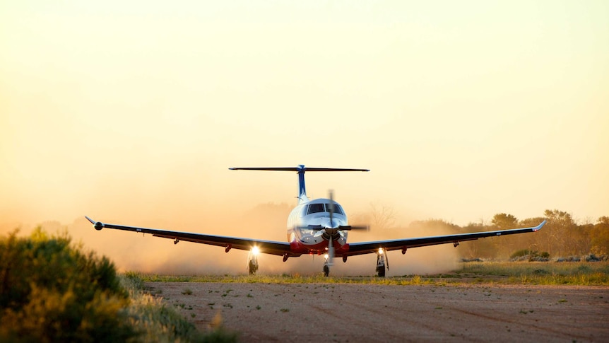 plane landing in outback australia.