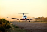 plane landing in outback australia.