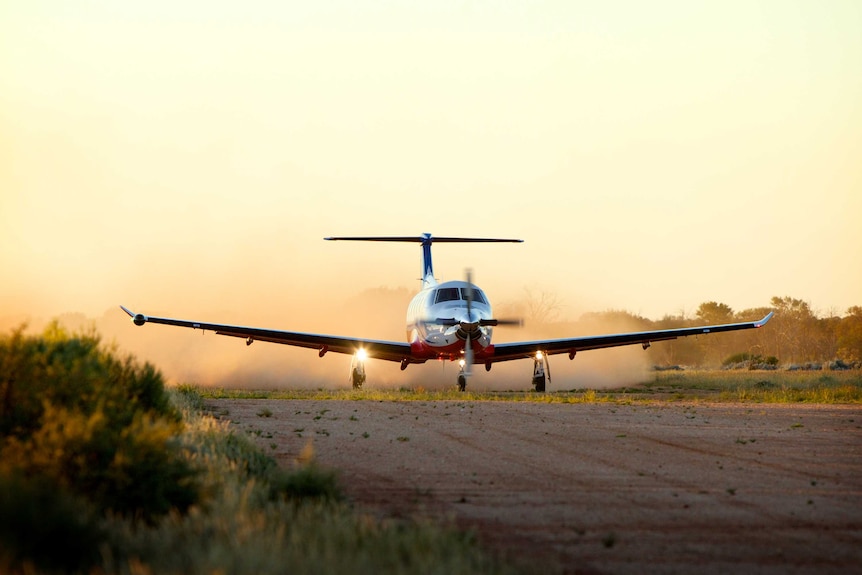 plane landing in outback australia.