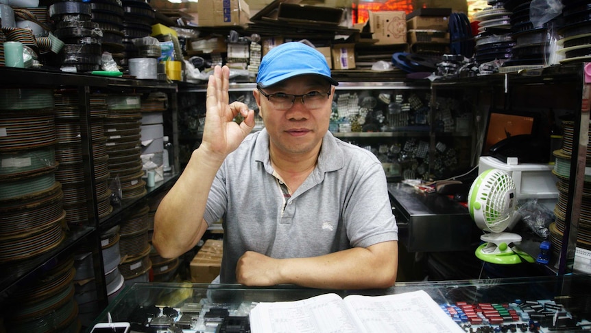 A Chinese man in a cap