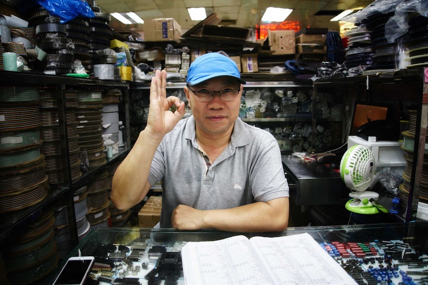 A Chinese man in a cap