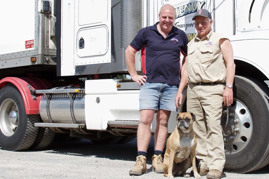 Troy, Keith and Boots Henry in front of one of their trucks at St Arnaud.