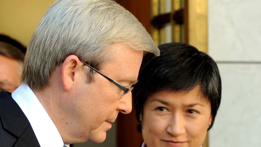 Prime Minister Kevin Rudd speaks to Climate Change Minister Penny Wong