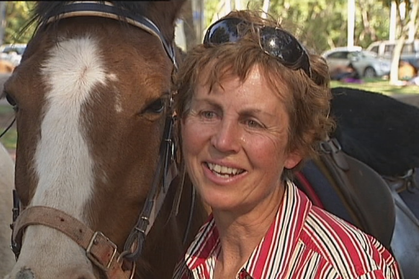 Sue Close with her horse after crossing the country from Apsley in Victoria to Darwin NT.