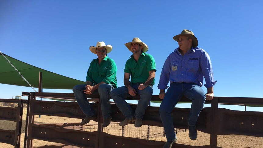 Adam Giles (on right in blue shirt) with Kidman station managers Peter Raleigh (centre) and Ian Halstead (left).