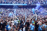 Manchester City fans break the goal posts after Premier League title win