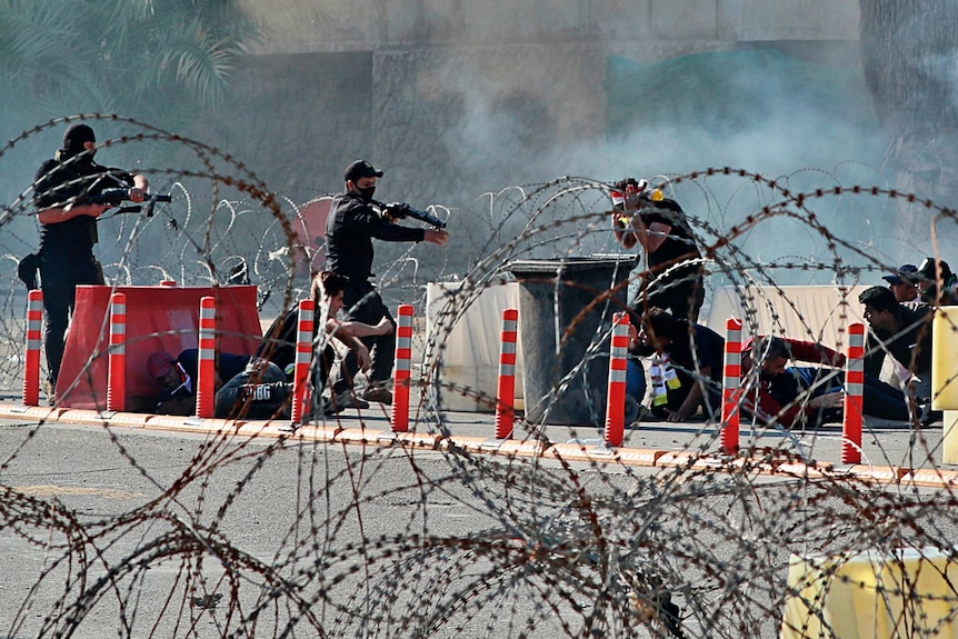 Iraqi security forces fire tear gas to disperse protesters in Baghdad