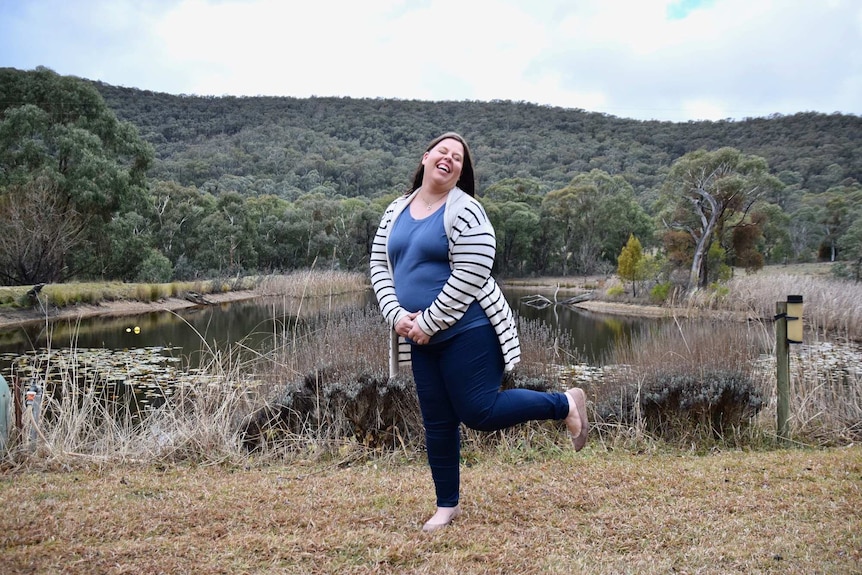 Portrait of Sarahjane Bradford who overcame experiences of domestic violence and is grateful to her elected parents for support.