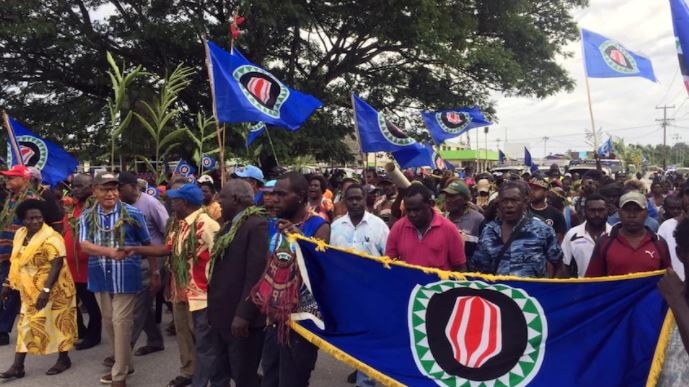 A crowd march triumphant during a referendum vote in Bougainville Papua New Guinea