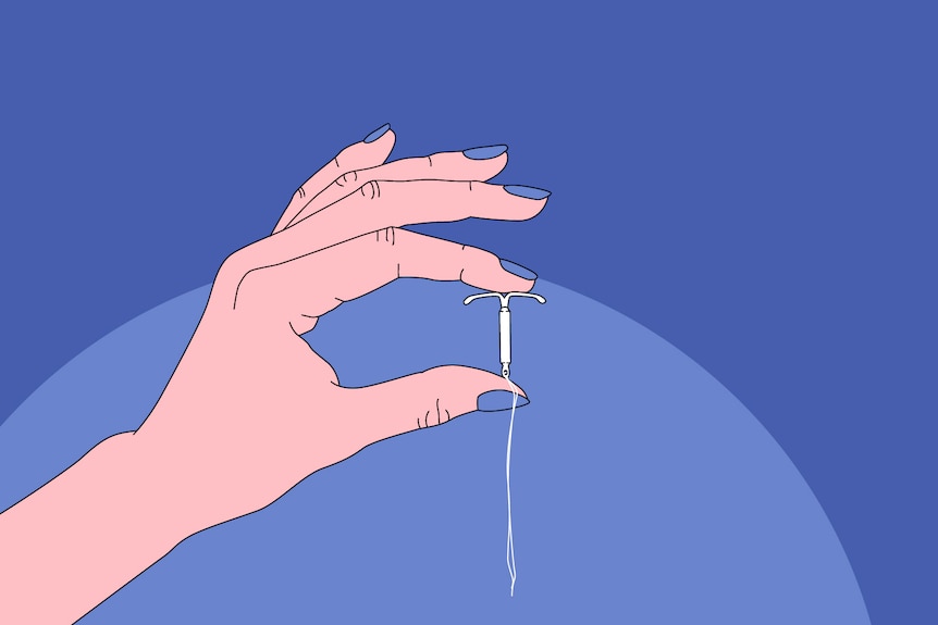 A cartoon illustration of a light-skinned hand holding a small IUD between its fingertips.
